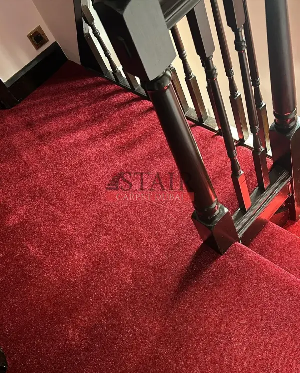 Staircase View of Red Color Carpet In Dubai