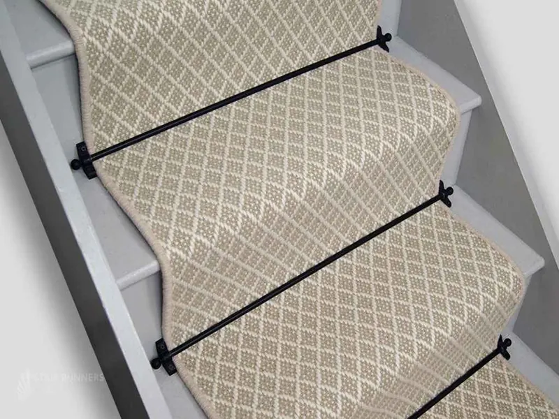 Herringbone pattern sisal carpet for stairs.