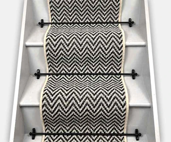 Luxury Heigbone style sisal stair carpeting in a Dubai home.