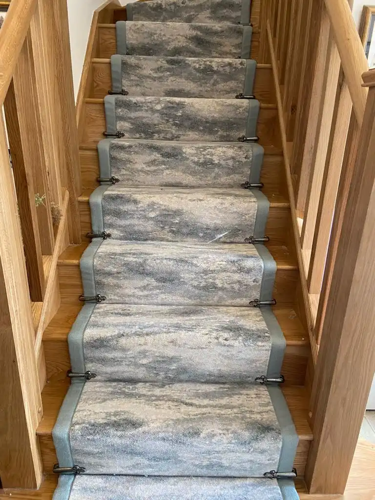 Soft grey stair runner with black