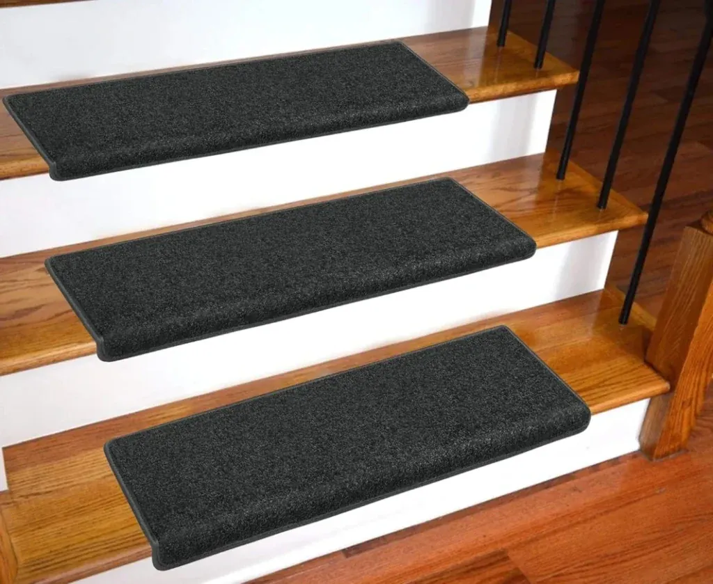 Black-carpet-treads-on-oak-stairs-with-white-risers